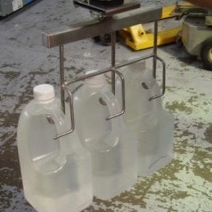 Lifting bottles into place for Birch and Waite