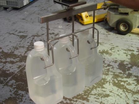 Lifting bottles into place for Birch and Waite