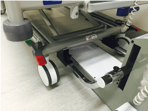 Evo Bed Mover attaching to hospital bed