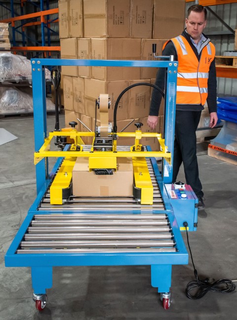 PMCS 150 Carton Taping Machines Application